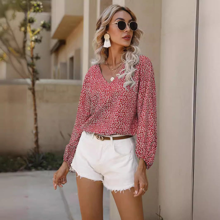 Women’s blouse with voluminous sleeves and V-neck Lune London