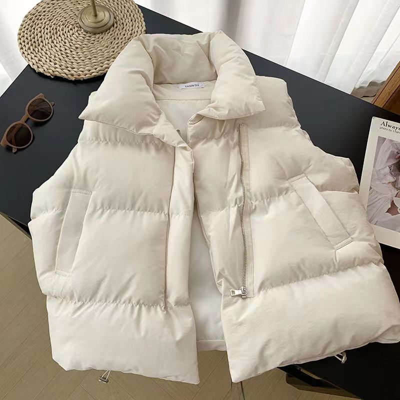 Ladies quilted vests with high collar and practical side pockets Lune London
