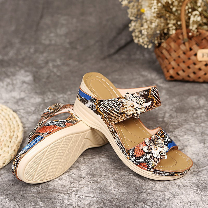 Comfortable wedge sandals for women with floral appliqués and elastic straps Lune London