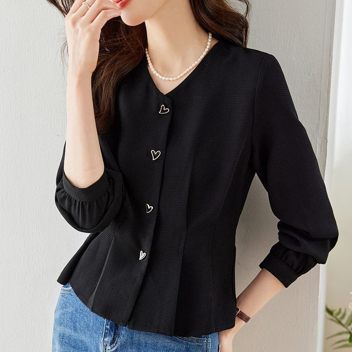 Blouse élégante pour femmes avec des détails de bouton en forme de cœur et des manches volumineuses Chic & Stil