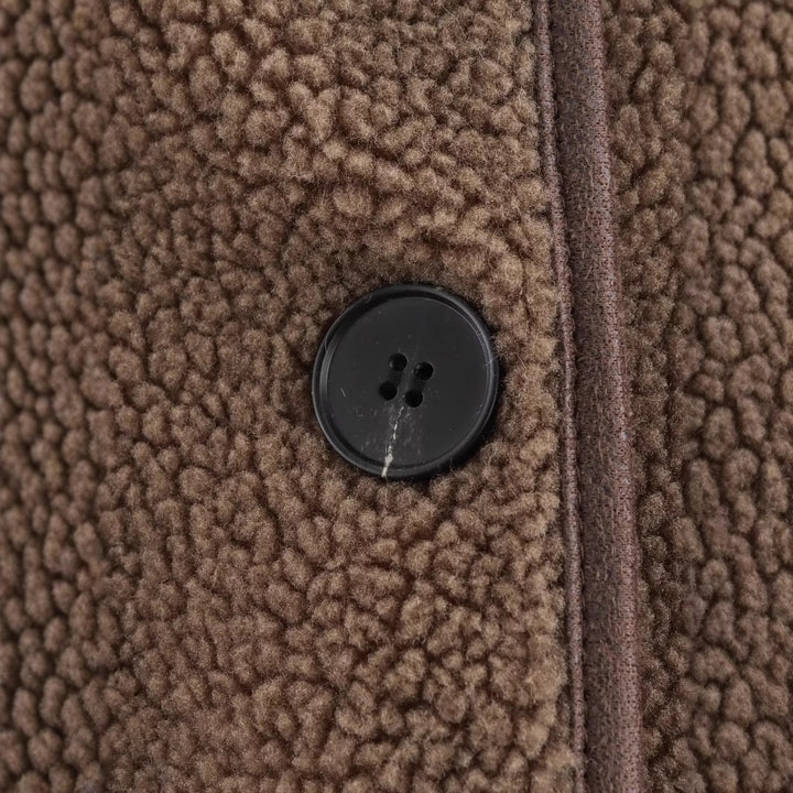 Veste en polaire pour femmes avec poches pratiques et détails boutonnés Chic & Stil