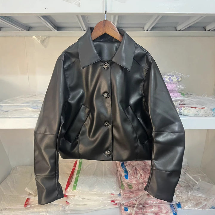 Women's faux leather jacket with modern button details Lune London