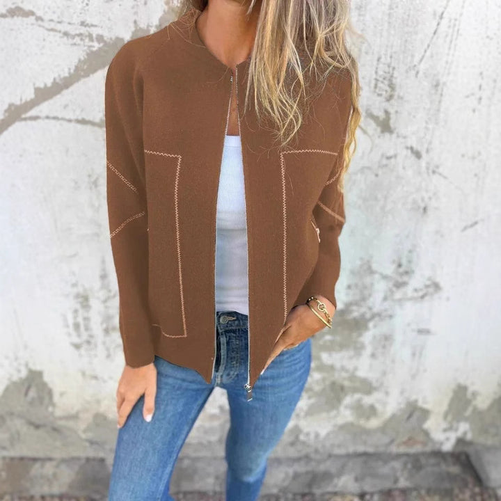 Ladies' knit jacket with stylish zipper details and a fine textured pattern Lune London