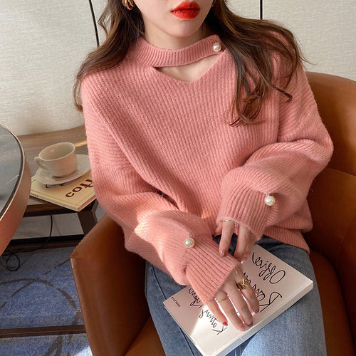 Pull en tricot pour femmes avec un look cut-out raffiné et des manches ornées de perles Lune London