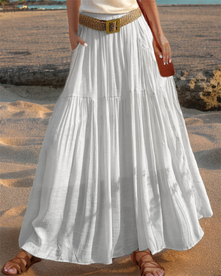 Maxi flared skirt for women with elegant pleated draping and practical pockets Lune London