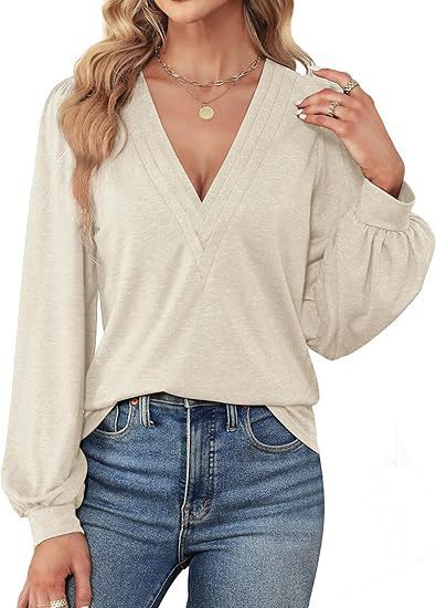Elegant women's top with V neckline and puff sleeves Lune London