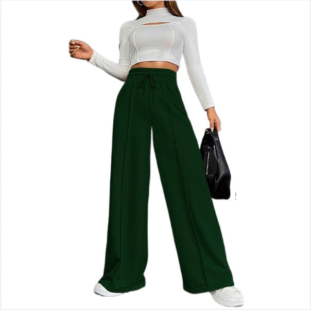 Wide sports pants for women with elastic waistband and side pockets Lune London