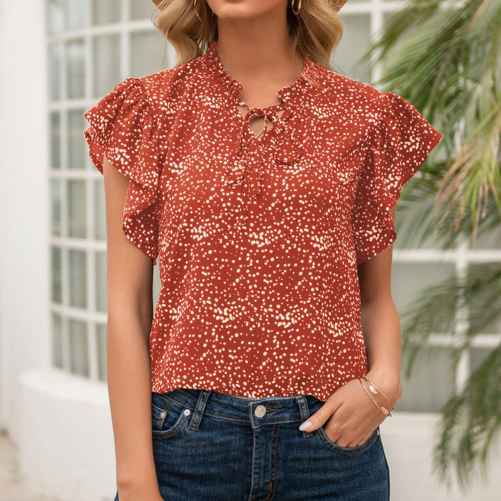 Women's blouse with ruffled sleeves and a woven polka dot pattern Lune London