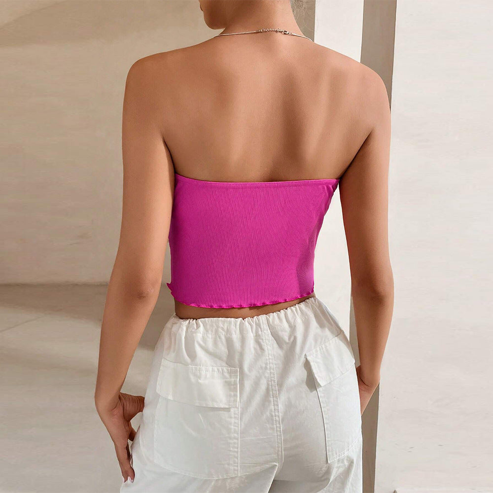 Chic & Stil Short women's bodysuit with off-shoulder design and asymmetrical hem