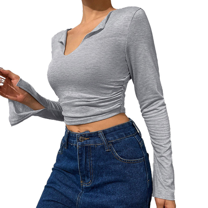 Short women's shirt with trendy bell sleeves and an elegant V neck Chic & Stil