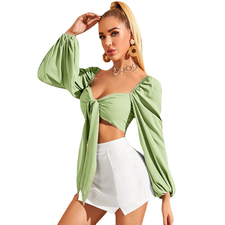 Women's blouse with a sophisticated knot design and voluminous sleeves Chic & Stil