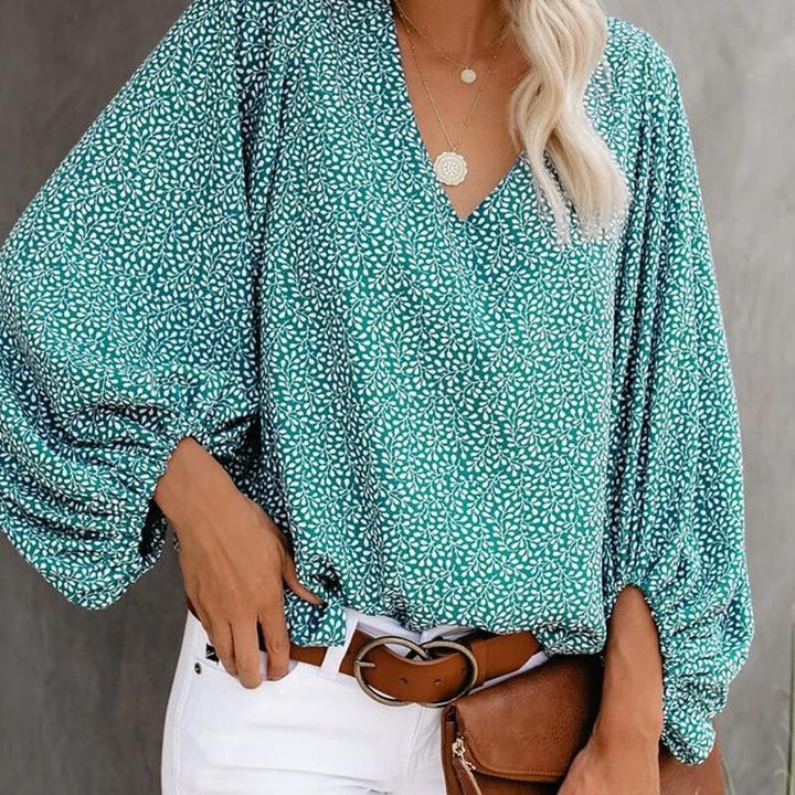Blouse féminine à la mode avec des manches larges et un col en V Chic & Stil
