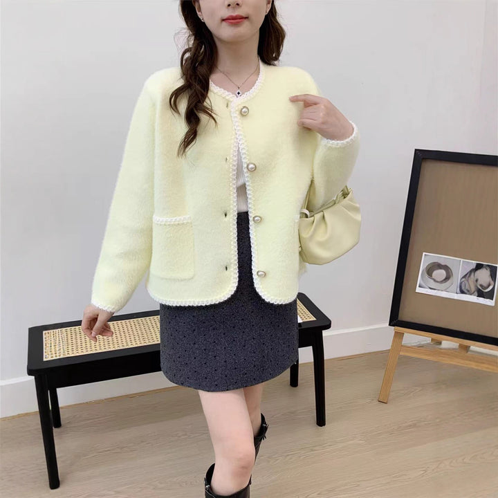 Cardigan féminin élégant avec patte de boutonnage décorative et poches