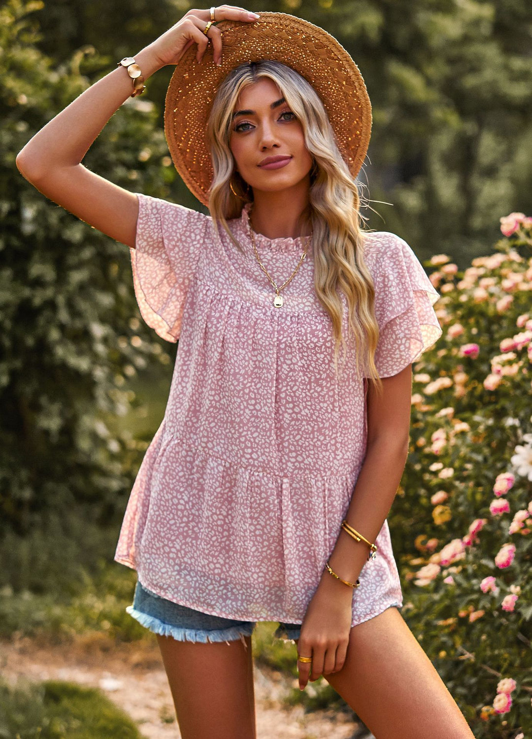 Dynamic women's blouse with ruffled details and floral design Lune London
