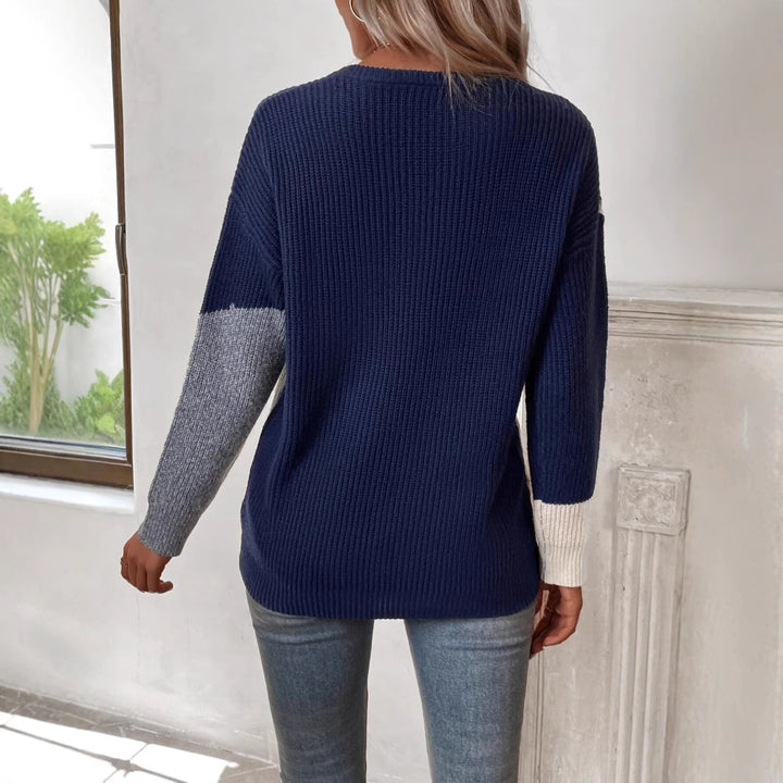 Ladies trendy knitted sweater with chic twisted design