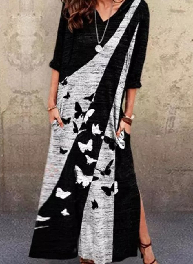 Maxi dress for women with an artistic butterfly design and practical pockets Lune London