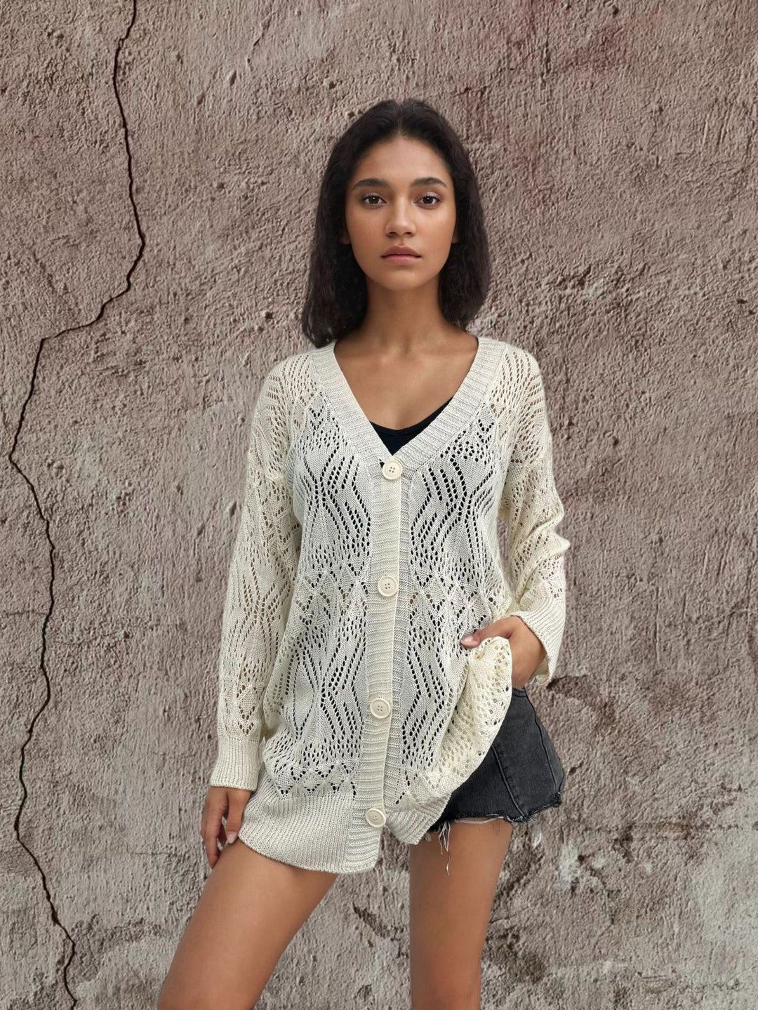 Ladies lightweight cardigan with delicate crochet pattern and chic button details