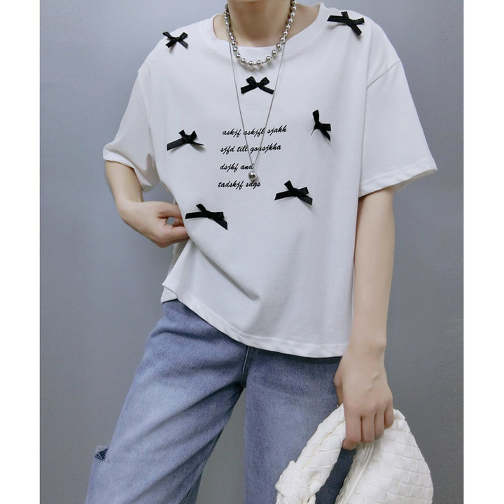 Ladies stylish graphic T-shirt with chic knot accents