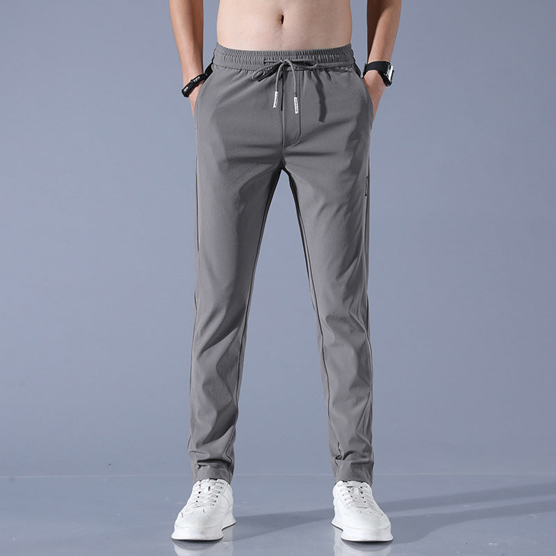 Men's sports pants with adjustable drawstring and zippered pockets on the sides Lune London
