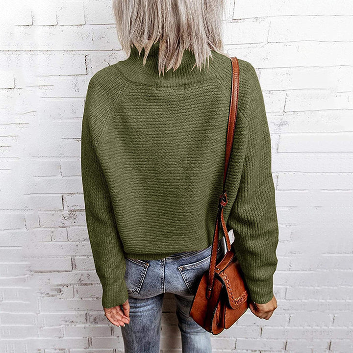 Trendy oversized women's sweater with stylish high collar and raglan sleeves Lune London