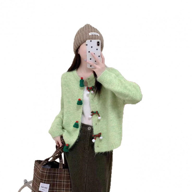 Cardigan pour femmes avec des appliqués festifs et des détails de boutons Chic & Stil