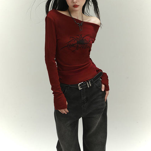 Women's long sleeve shirt with asymmetric neckline and graphic print