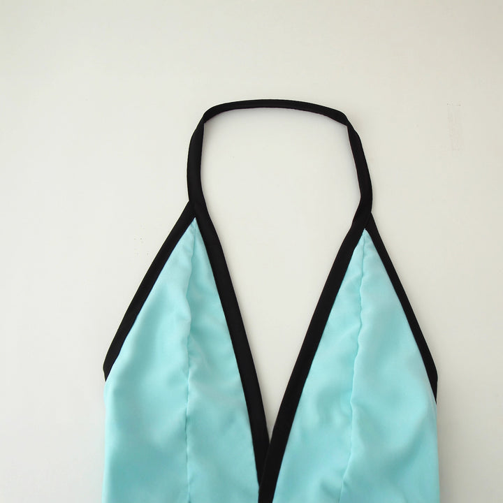 Maxi dress for women with an elegant halter neck and romantic ruffle details Lune London