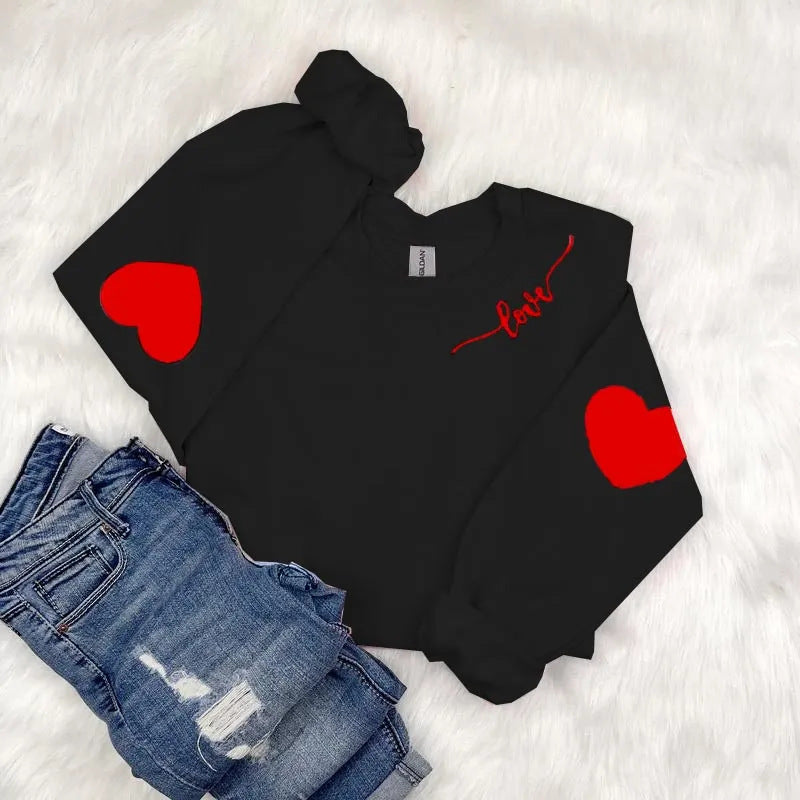 Sweatshirt femme avec design cœur et coupe décontractée Chic & Stil