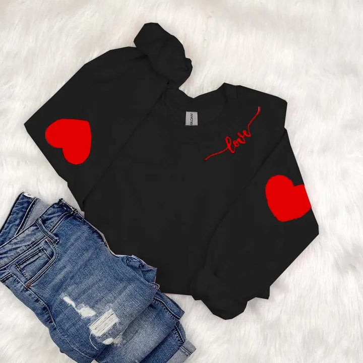 Sweatshirt femme avec design cœur et coupe décontractée Chic & Stil
