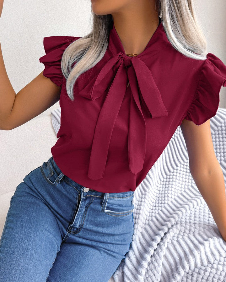 Ladies Blouse with Ruffle Details and Chic Bow Element Lune London