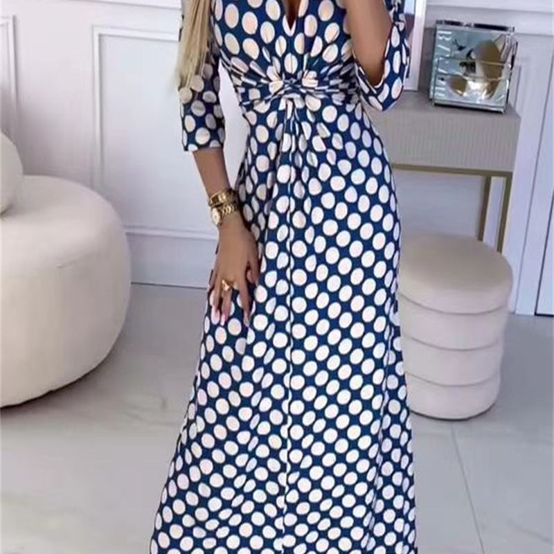 Maxi dress for women with a modern polka dot pattern and an elegant crossover appearance Lune London