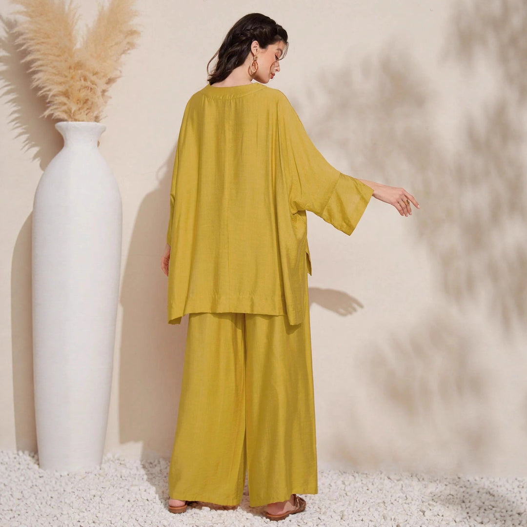 Ensemble décontracté pour femmes en deux pièces avec un haut volumineux et un pantalon large Chic & Stil