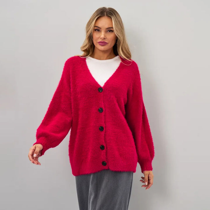 Cardigan confortable pour femmes avec coupe asymétrique et fermeture par bouton Chic & Stil