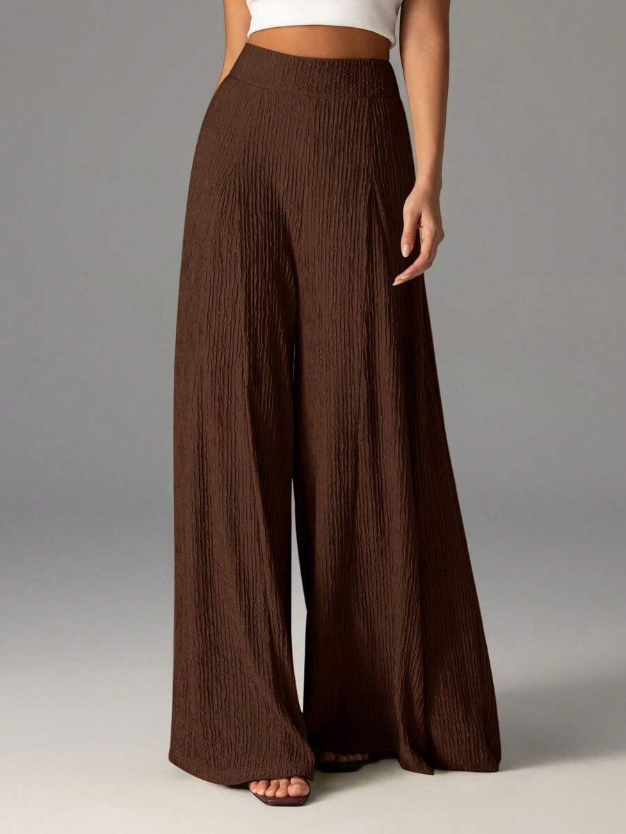Wide pleated pants for women with high waist and elastic waistband Lune London