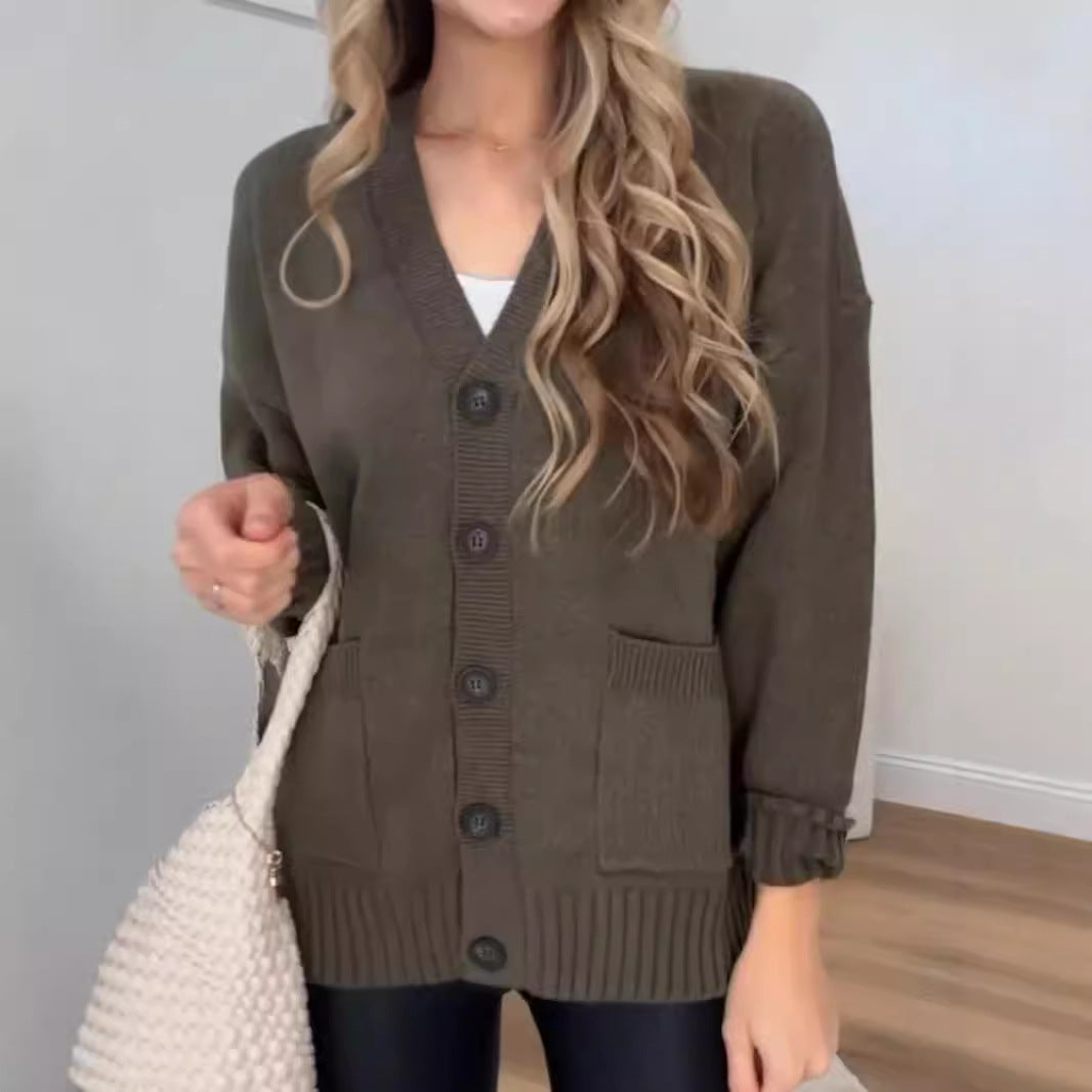 Women's knitted jacket with pockets and modern buttons Lune London