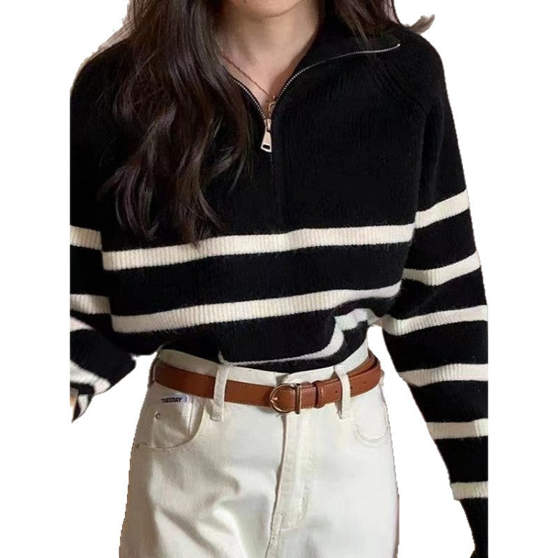 Pull féminin à la mode avec une fermeture éclair solide et un motif rayé Chic & Stil