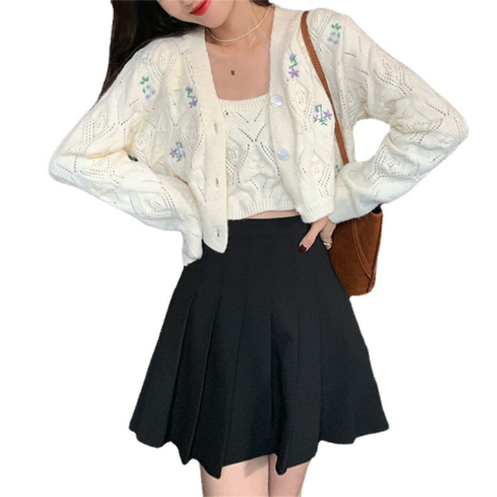 Ladies short knit vest with floral accents and openwork pattern Lune London