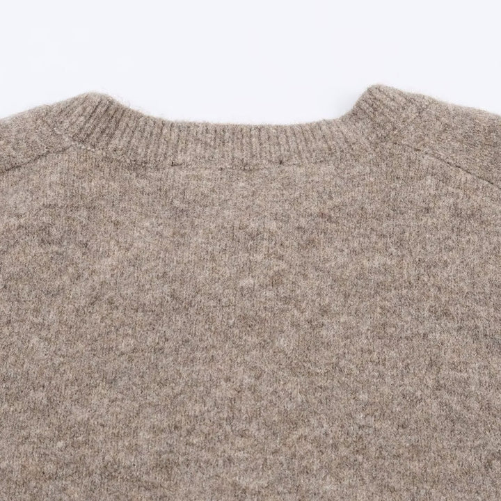Short knitted jacket for women with button closure Lune London