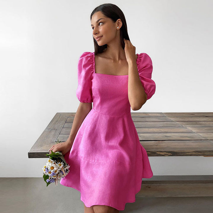 Women's Playful Dress with Generous Puff Sleeves and Swinging Hem Lune London