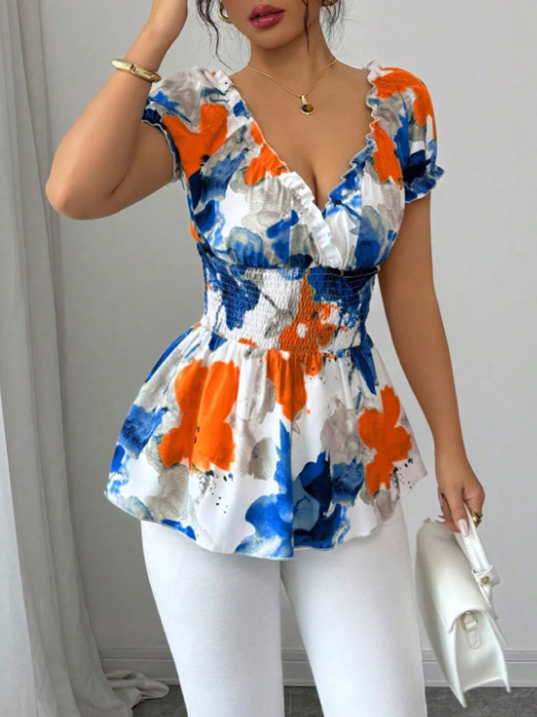 Blouse femme avec volants floraux et taille élastique Chic & Stil