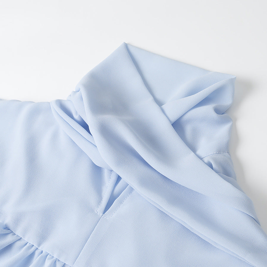 Women elegant blouse with voluminous ruffles and asymmetrical cut Lune London