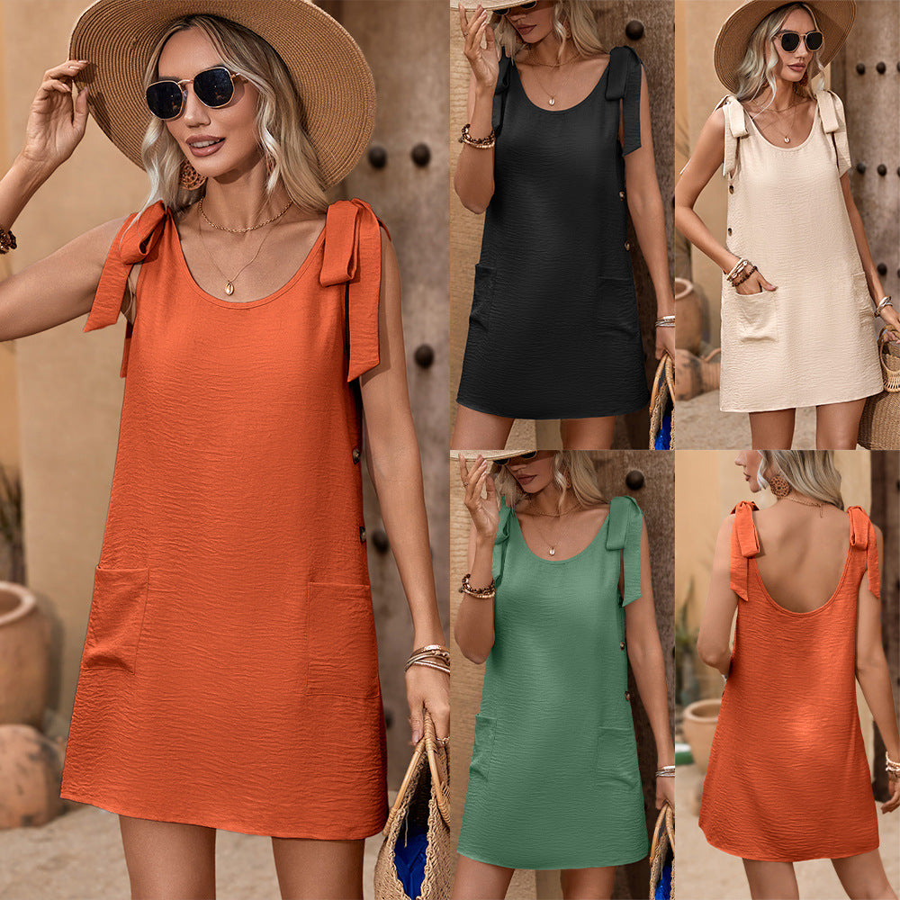 Casual summer dress for women with decorative straps and practical pockets Lune London