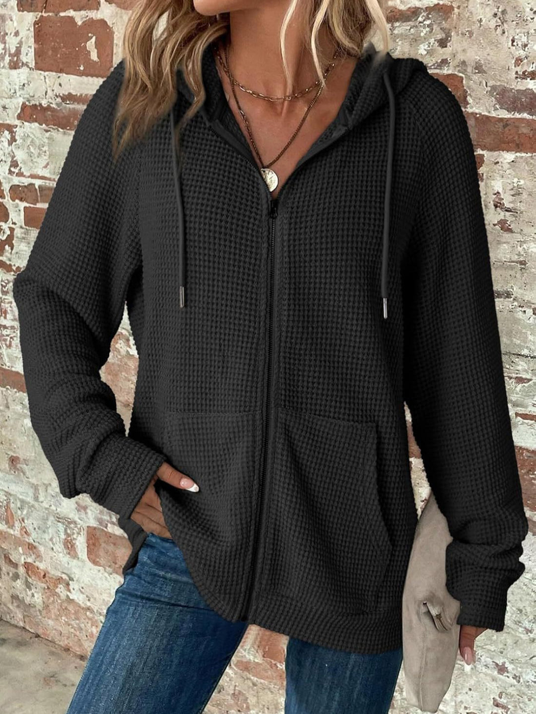 Casual hoodie for women with structured embossed pattern and practical pockets Lune London