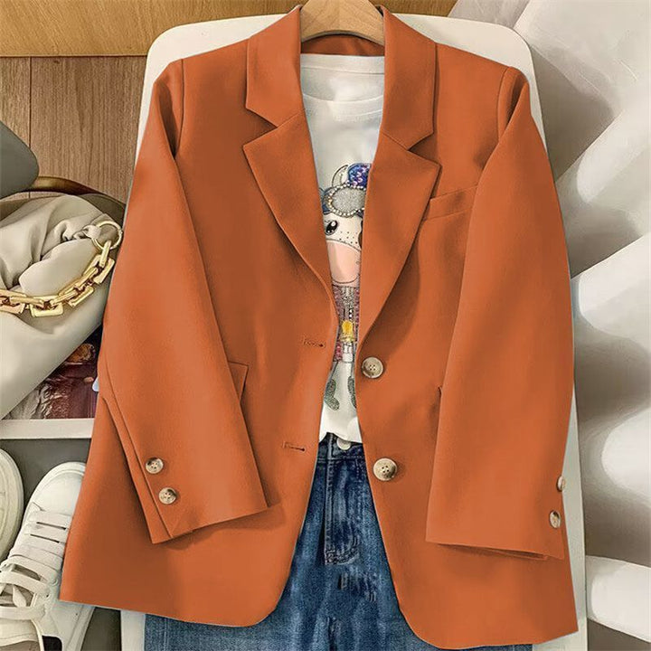 Blazer féminin chic avec tissu texturé et détails de bouton élégants Chic & Stil