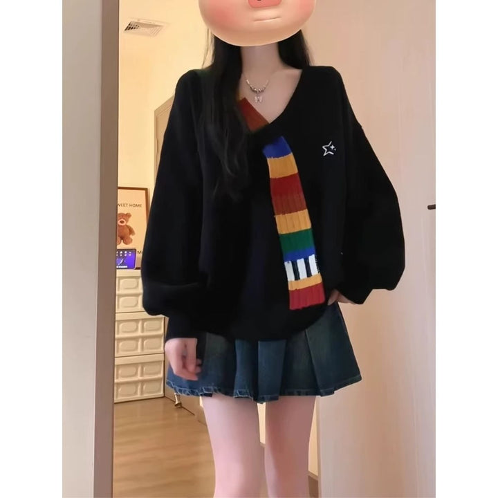 Pull élégant pour femme avec col en V et rayures colorées Chic & Stil