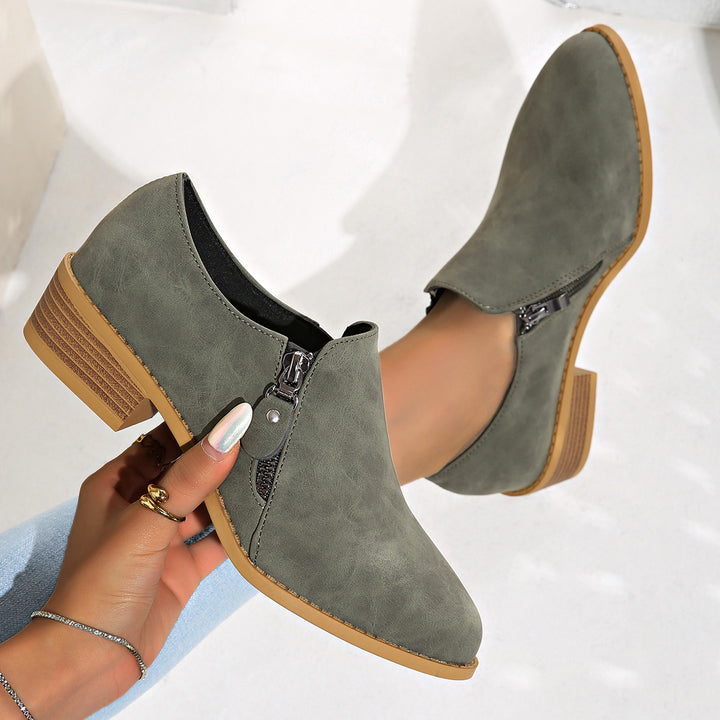 Women’s biker ankle boots with trendy zipper and comfortable sole Lune London