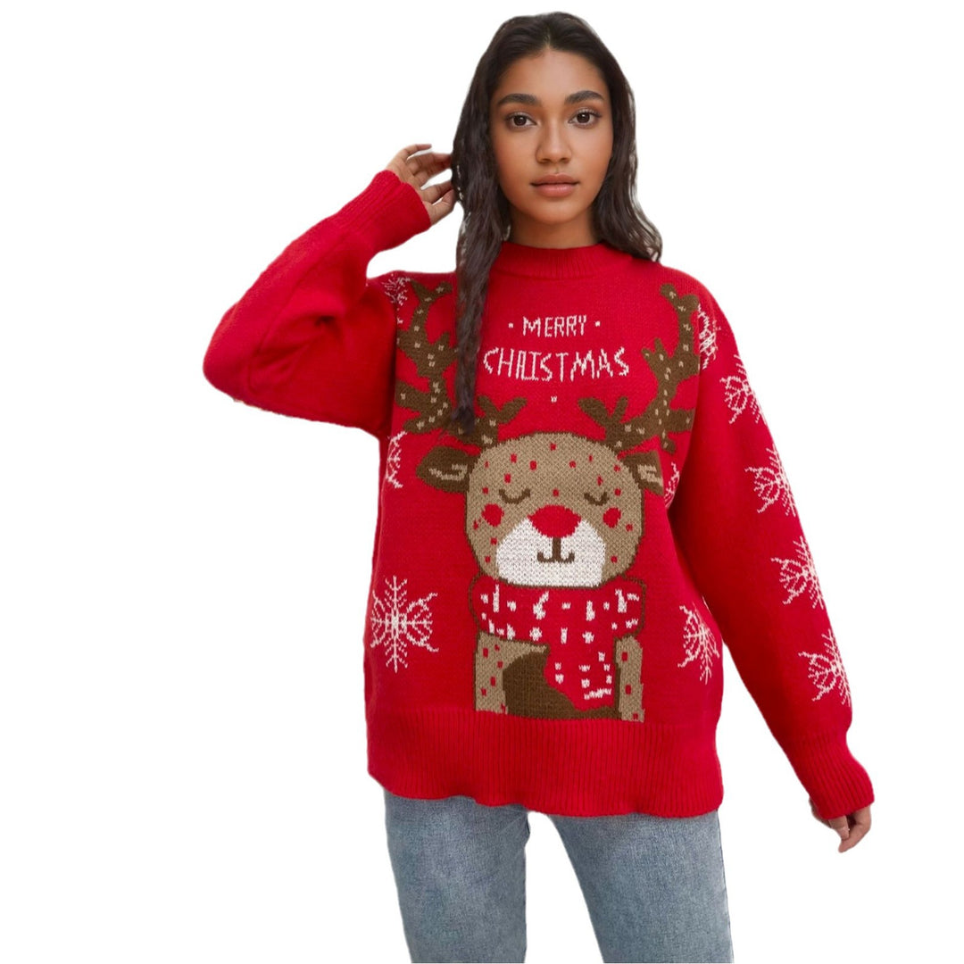 Christmas sweater for women with a cute reindeer pattern and winter snowflakes Lune London
