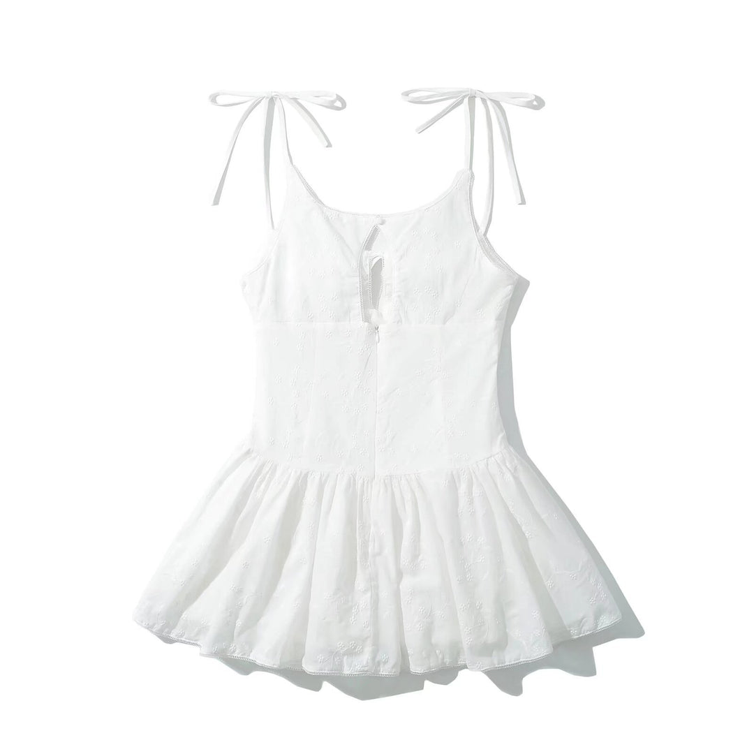 Airy summer dress for women with adjustable spaghetti straps and ruffled hem Lune London