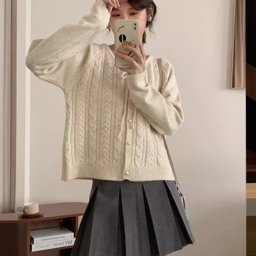 Chunky knit jacket for women with elegant pearl buttons and a structured design Lune London