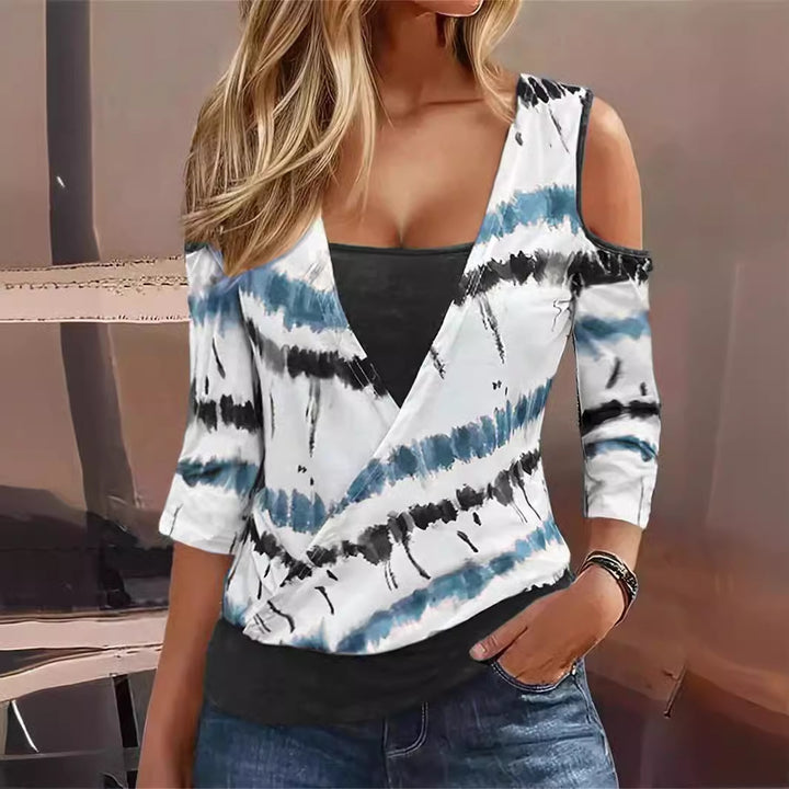 Women wrap top with cut-out sleeves and a unique batik design Lune London